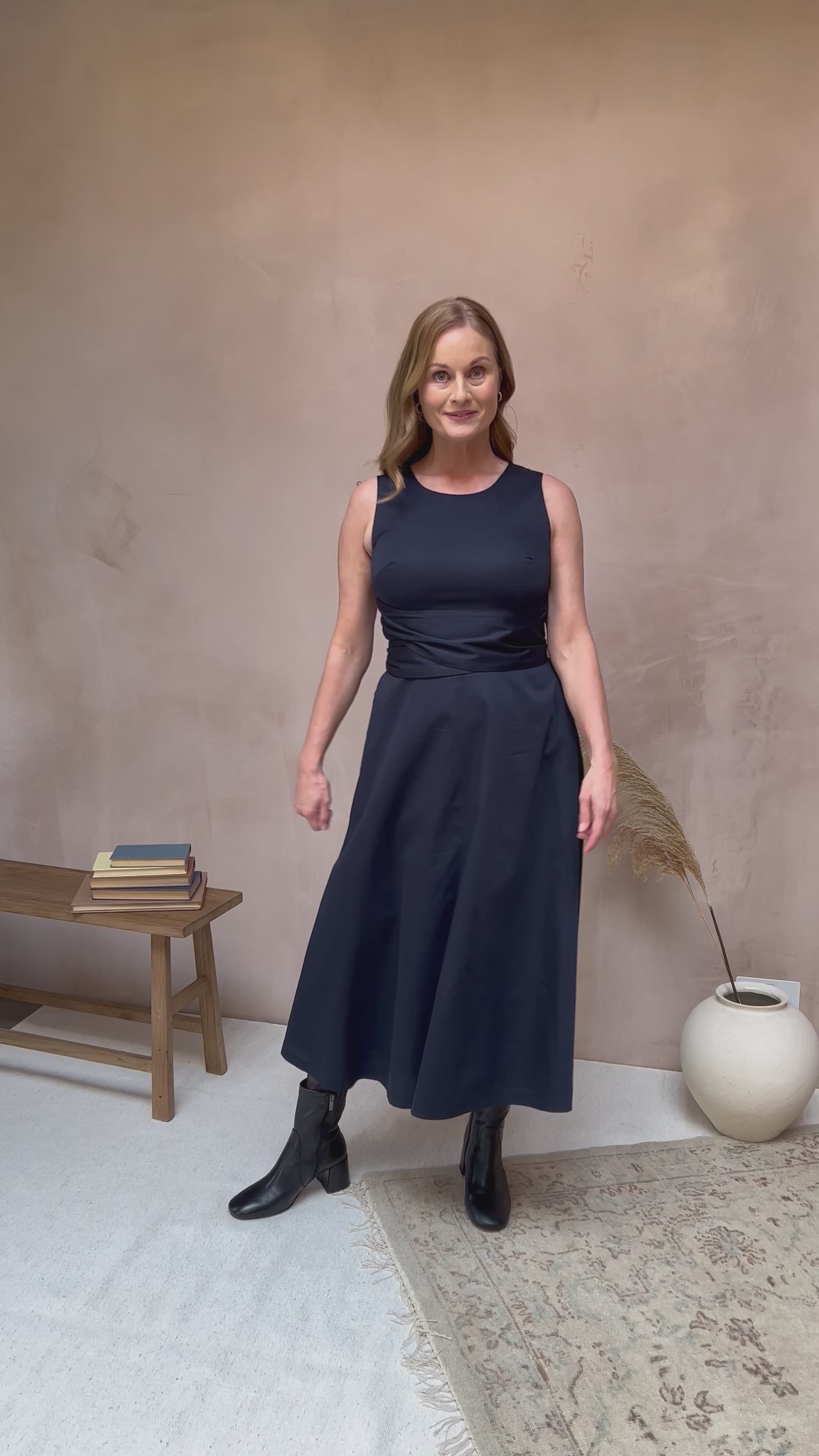 Video showcasing the Roberta Dress in Midnight Navy Cotton Satin by Emily and Fin. 
